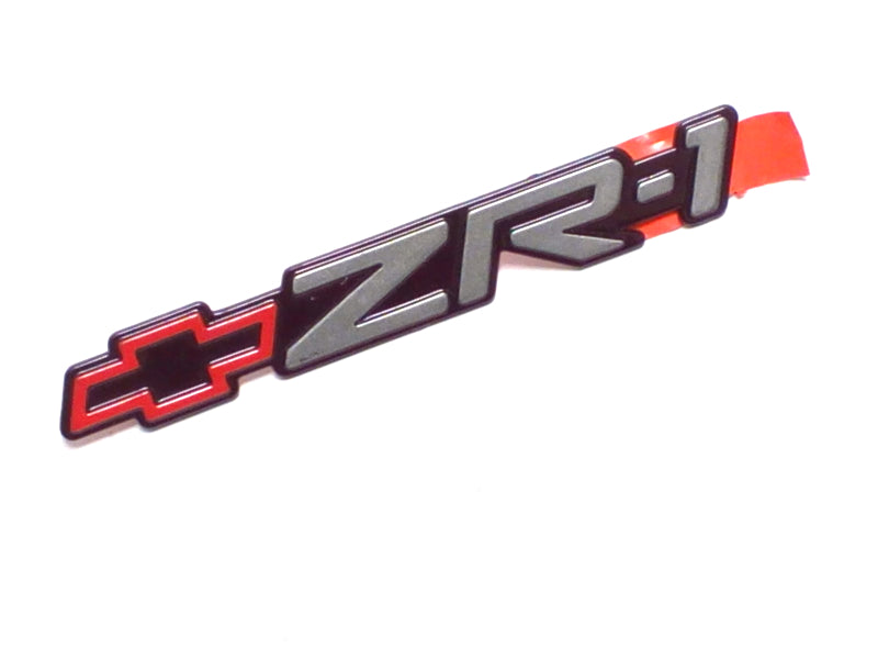 New OEM 1995 Corvette ZR-1 Dark Purple W/ Gray Letters Bumper Emblem, Part # 10233119