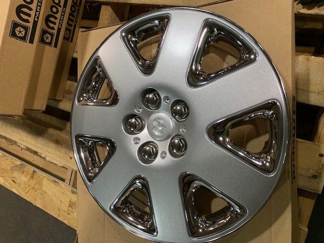 New 2001-2002 Fits Chrysler Sebring, Stratus Wheel Cover - Part # RA42PAKAD