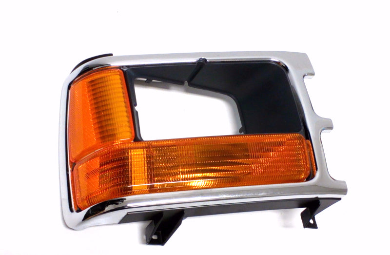 New OEM 1991-1992 Dodge Dakota Passenger Headlamp Bezel Turn Signal, Part # 55054514